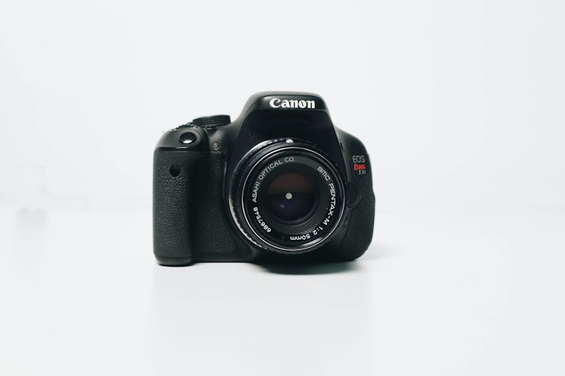 Camera on tripod in mountains